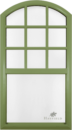Beautyifully rounded green, wood-textured trim specialty window with rounded top and grid